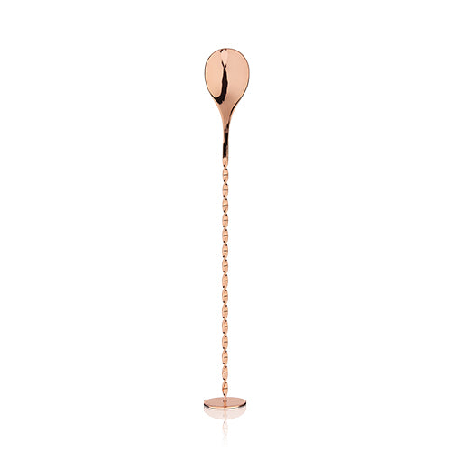 a copper bar spoon